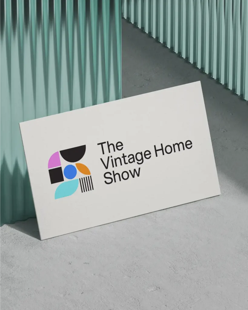 A business card with The Vintage Home Show logo