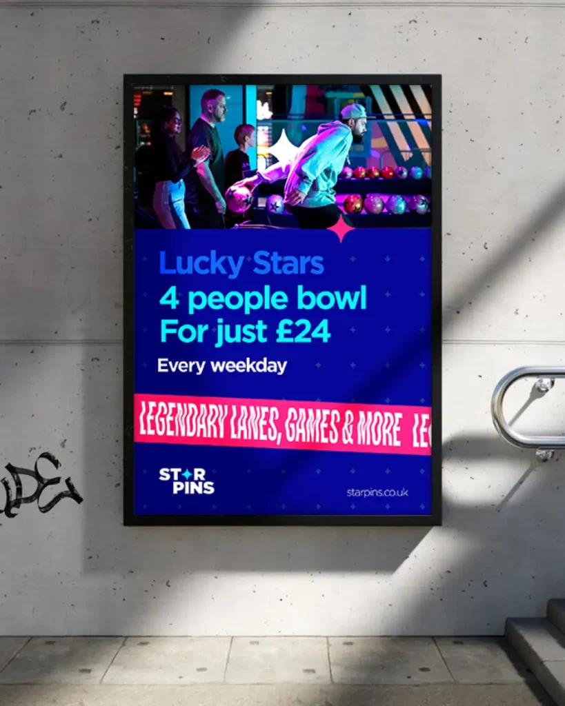 A star pins poster displayed in a train station