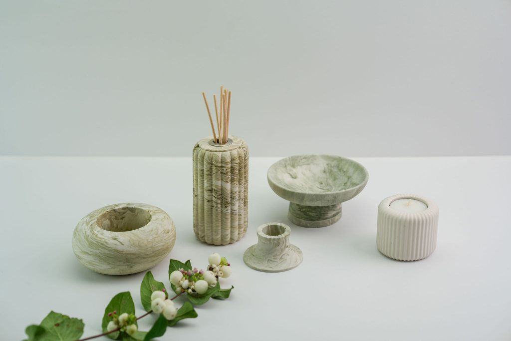A professional photograph of products by inside seventy two including candle holders and diffusers