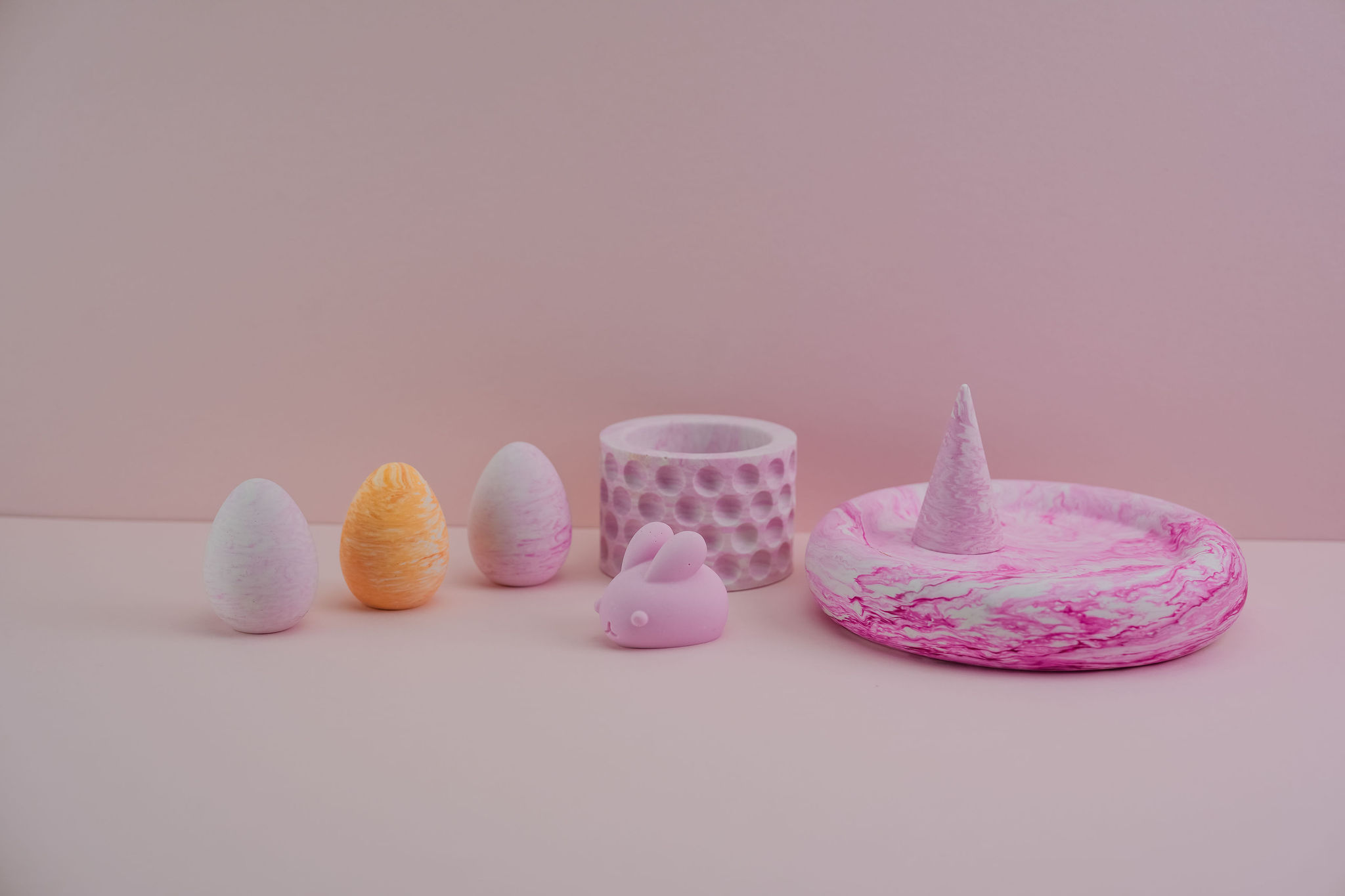 Professional product photo of pink jesmonite homewares