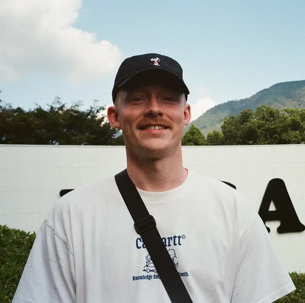 headshot of Will, web designer at little green jesus
