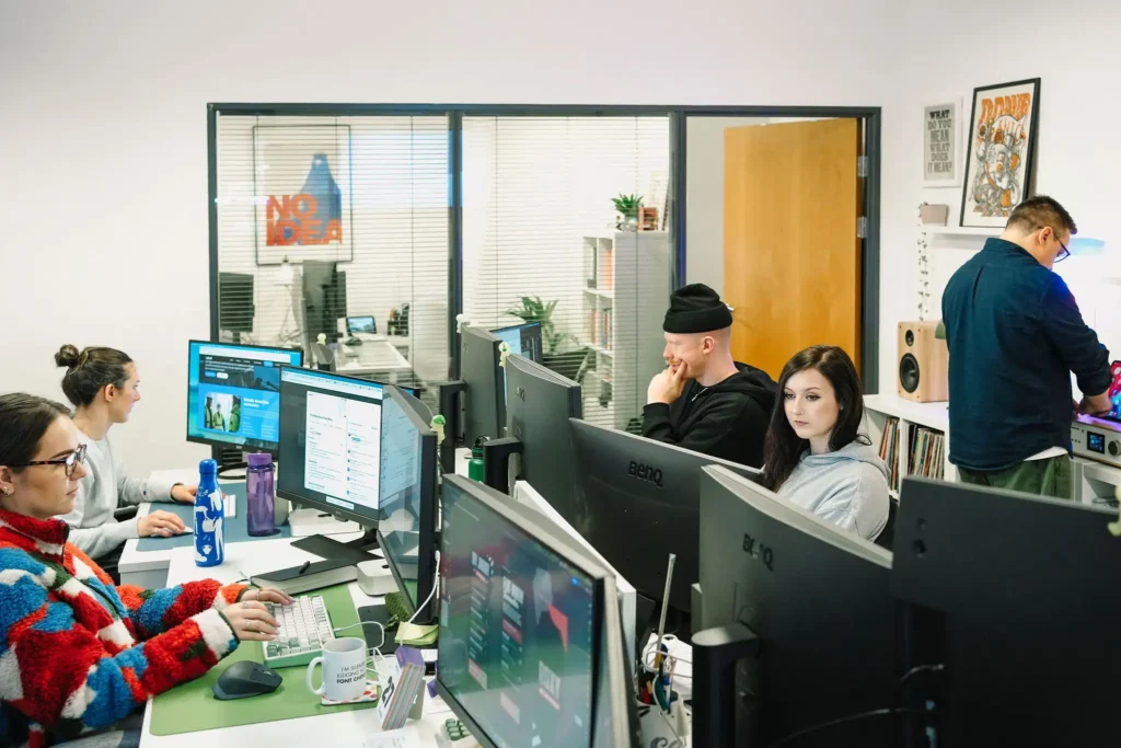web design and graphic design team working together in their leeds office