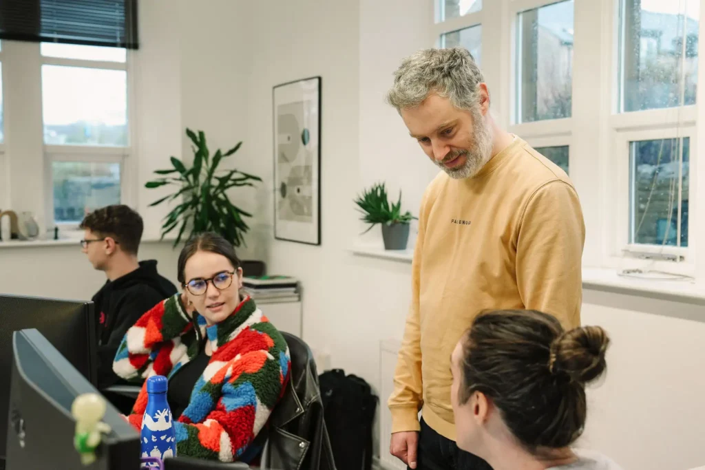 The little green jesus web and graphics team collaborating