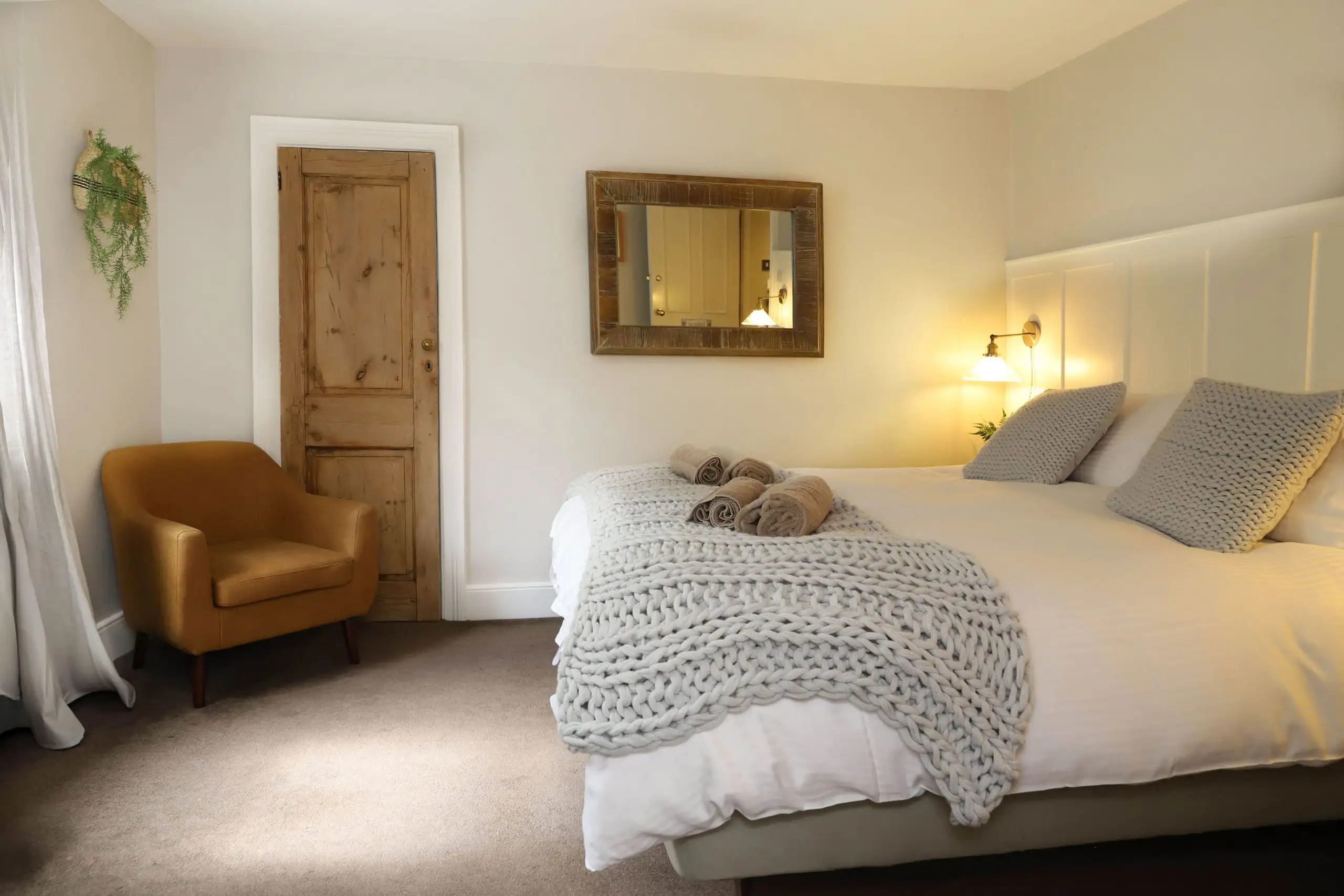 A cosy hotel room as part of a commercial photography shoot for a hotel