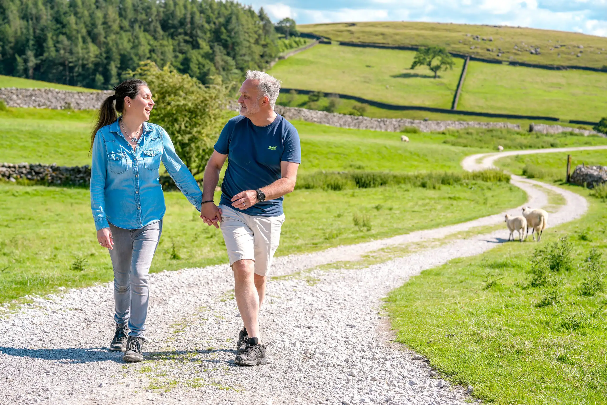 The owners of new inn posing for their online content