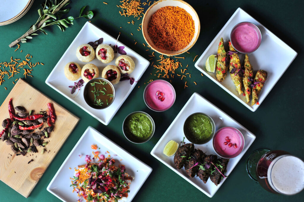 a colourful table of Indian food shot for The Cat's Pyjamas.