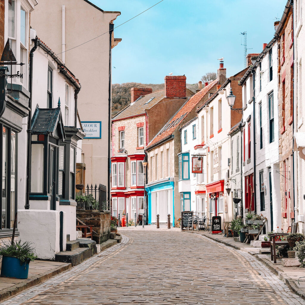 Sunny seaside town shot by Little Green Jesus